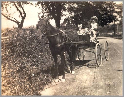 Photo of Mother driving Maude, taking us to middle school
